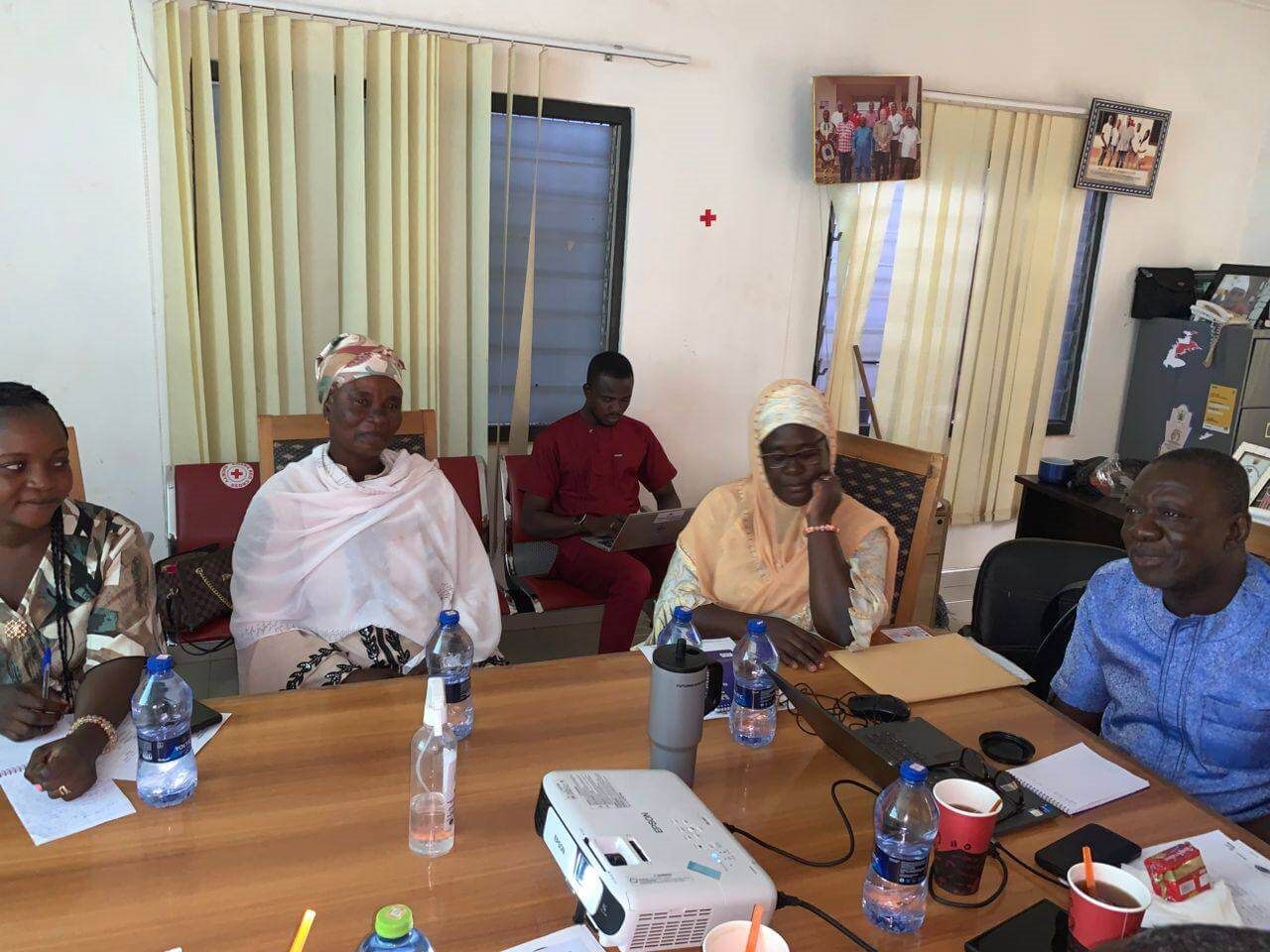 Board members and community representatives in a planning meeting in Tamale